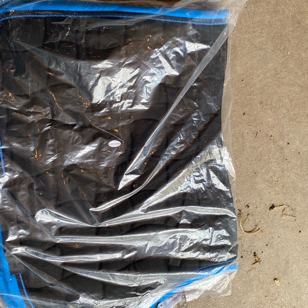 brand new black and blue saddle pad